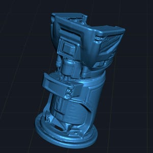 May include: A 3D-rendered, light blue object with a futuristic design. The object has a cylindrical base, a central body with rectangular and curved details, and a top section with a wide opening. The overall shape suggests a mechanical or technological component.