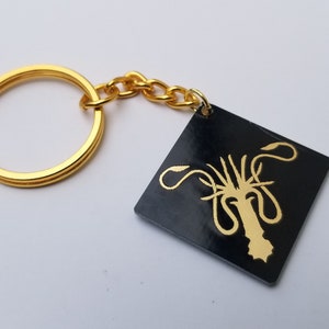 GOT Greyjoy sigil and words keychain, zipper pull