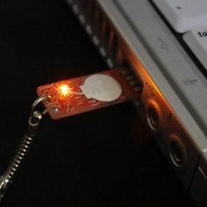 Circuit Board Keychain with Bomb - lights up