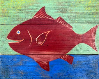 May include: A red fish painted on a wooden plank background. The fish is painted in a stylized manner with a blue eye and a slight smile. The background is painted in shades of green and blue.