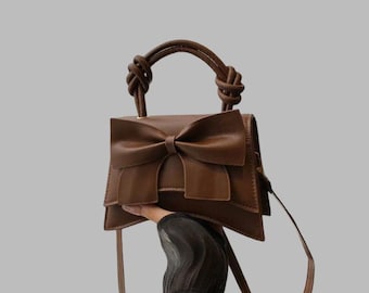 Brown Bow Handbag with Top Handles and Crossbody Strap