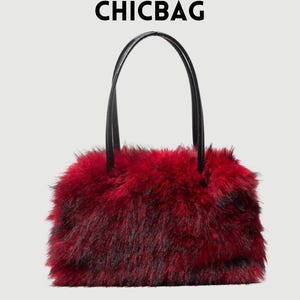 May include: A rectangular handbag with a fluffy, deep red and black faux fur exterior. The bag has two black handles and the word "CHICBAG" is printed in black at the top.