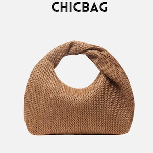 Handwoven Raffia Shoulder Bag: Boho Beach Tote with Knotted Handle