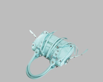 Turquoise Studded Satchel Bag with Tassels, Zipper Pockets and Shoulder Strap