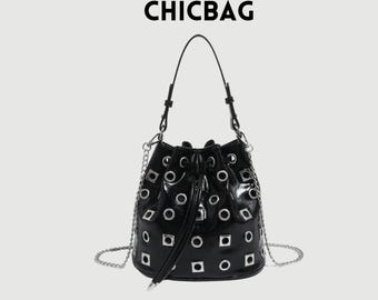 Black Patent Rivet Bucket Bag – Edgy Chain Crossbody with Grommet Detail