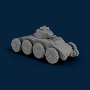 May include: A gray armored vehicle model with eight wheels, a turret, and a cannon. The vehicle has a detailed design, with visible tire treads and other mechanical features. The model is set against a dark blue background.