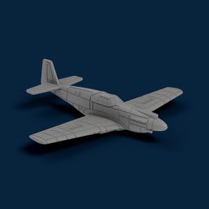 May include: A gray model airplane with a propeller, wings, and tail fin. The plane is a detailed replica of a vintage aircraft, showcasing panel lines and a cockpit. The model is set against a dark blue background.