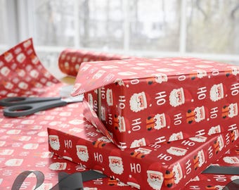 Papier do pakowania prezentów świątecznych z motywem Świętego Mikołaja, efektowny świąteczny papier do pakowania prezentów