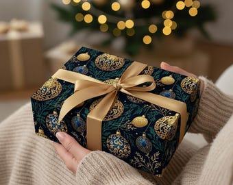May include: A wrapped gift box with a festive Christmas design. The wrapping paper is dark blue with gold and blue ornaments and gold accents. A gold ribbon is tied around the box in a bow.