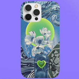 May include: A phone case with a collage design. The case features a blue bottle with a green heart, white flowers, and a green circle against a blue and white background. The case has a purple border.