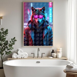 May include: A framed art print featuring a wolf wearing pink sunglasses and a black leather jacket. The wolf is set against a neon cityscape background with red and blue hues. The artwork is displayed above a white bathtub.