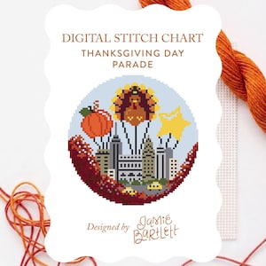 May include: A digital stitch chart titled Thanksgiving Day Parade featuring a pixel art illustration of a city skyline with a turkey, pumpkin, and star balloon floating above, designed by Jamie Bartlett, with orange embroidery floss nearby.