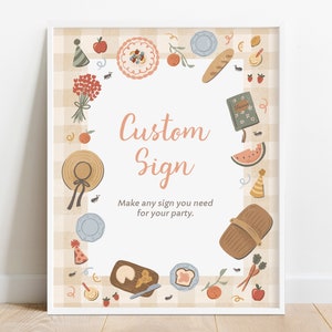 Op de afbeelding: Een op maat gemaakt bord met een picknickthema. Het bord heeft een lichtperzik achtergrond en een rand met picknick illustraties, waaronder eten, een hoed en feestversieringen. De tekst "Custom Sign" wordt weergegeven in een sierlijk lettertype.