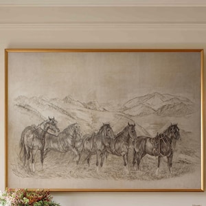 May include: A large, antique wooden sideboard with four doors and ornate carvings. Above it hangs a framed pencil sketch of horses in a landscape. The room is lit by sconces on either side of the artwork, creating a warm, inviting atmosphere.