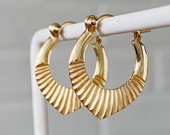 Yellow Gold small helios hoop earrings, hinge and latch closure, lightweight, textured, wear everyday, comfy, sunburst, sunbeam, solid gold