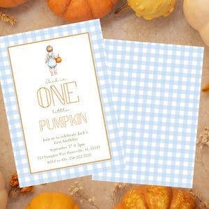 May include: A light blue gingham patterned invitation with gold text that reads "Jack is ONE little PUMPKIN". The invitation features a watercolor illustration of a child holding a pumpkin. The background includes pumpkins and fall foliage.