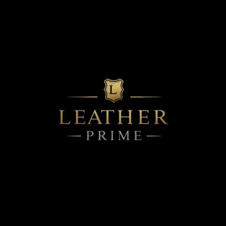 May include: Gold logo on a black background. The logo features a shield with the letter "L" inside, above the words "LEATHER PRIME" in gold. The text is centered and has lines above and below.