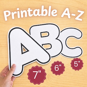 May include: White A, B, and C letters with black outlines, and the text "Printable A-Z" are displayed on a light wood surface. Three red scalloped circles show the sizes: 7", 6", and 5".
