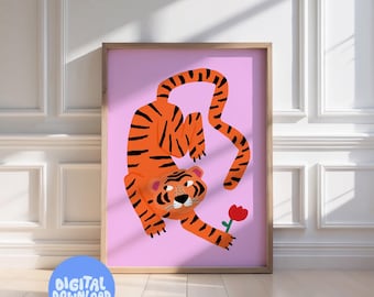 May include: A framed digital art print featuring a cartoon tiger with orange and black stripes on a pink background. The tiger holds a red flower. The words "DIGITAL DOWNLOAD" are in a blue circle in the lower left corner.