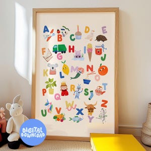 May include: A framed alphabet art print featuring colorful illustrations for each letter. The print includes images of a plane, ladybug, cupcake, duck, hedgehog, and more. A blue circle with the words "DIGITAL DOWNLOAD" is in the lower left corner.