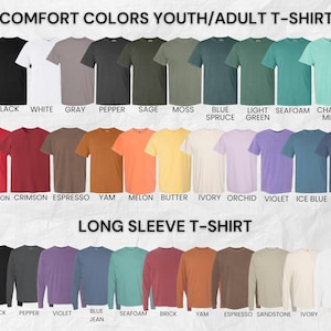 May include: A selection of Comfort Colors youth and adult t-shirts and long sleeve t-shirts in various colors. The short sleeve shirts include colors like black, white, gray, and blue. Long sleeve shirts are also available in colors like black, violet, and brick.
