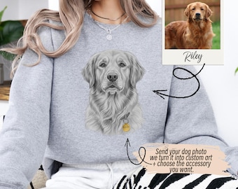 May include: A light gray sweatshirt featuring a detailed grayscale portrait of a Golden Retriever with a gold-colored tag that reads "Riley." A photo of a Golden Retriever is shown next to the portrait. Text on the image says, "Send your dog photo we turn it into custom art + choose the accessory you want."