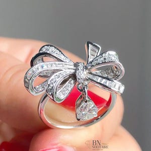 4.00 CTW Diamond Bow Ring, Moissanite Statement Ring, White Gold Ribbon Ring with Dangle Pear Charm, Anniversary Gift For Her, Unique