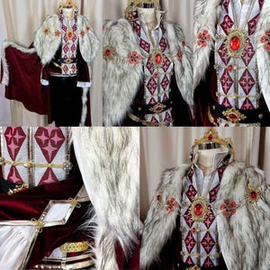 May include: A regal costume featuring a red and white patterned vest with gold accents, a fur-trimmed cape, and a gold crown. The ensemble includes a black skirt and a decorative belt with red jewels. The costume is designed with intricate details.