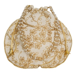 Bolso Potli bordado: accesorio artesanal indio para bodas y fiestas.