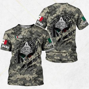 May include: A camouflage-patterned t-shirt featuring a design with a Mexican flag and Aztec-inspired imagery. The shirt has the word "MEXICO" and the word "NAME" printed on it. The back of the shirt has the word "YOUR" printed on it.
