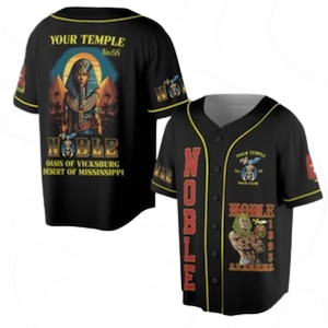 May include: Black baseball jersey with yellow trim and buttons. The front features the word "NOBLE" in red, and an illustration. The back displays "YOUR TEMPLE No.68" and an illustration of an Egyptian figure. The text "OASIS OF VICKSBURG DESERT OF MISSISSIPPI" is also visible.