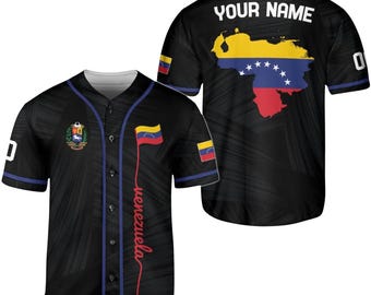 May include: Black baseball jersey with a Venezuela flag design. The jersey features the Venezuelan flag, the word "Venezuela" in red script, and the text "YOUR NAME" on the back. The jersey has blue and white accents.