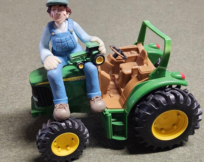 John Deere ERTL Toy Tractor And D. Manning Limited Edition Shelf Sitter Figure