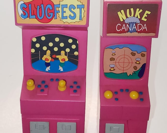 Vintage The Simpsons Noiseland  Arcade Toy Set Games Nuke Canada and Slugfest