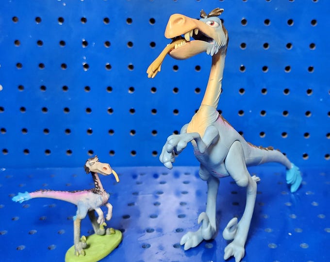 Disney The Good Dinosaur Bubbha Velociraptor Figure Bundle Two Figures Included