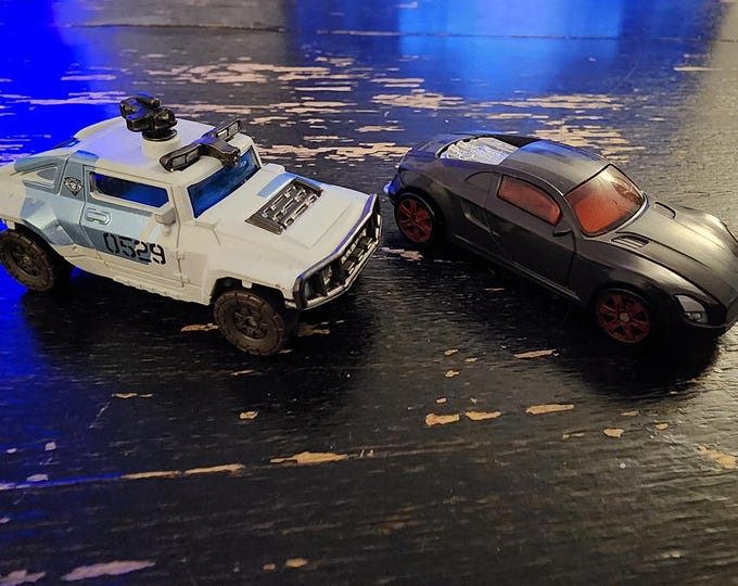 Transformers 1:64 Scale Cars. These Cars Do Not Transform. Sideways and Rollbar