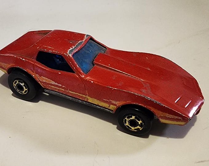 Hot Wheels 1980 Chevy Corvette Stingray Hot Ones Blackwall 1:64 Scale Diecast