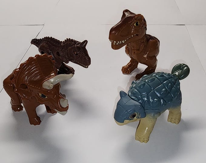 McDonalds Jurassic World Camp Cretaceous Lot of 4 Dinosaur Figure Bundle