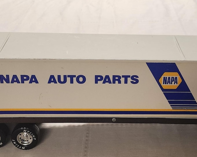 Vintage Nylint NAPA Auto Parts Pressed Steel Semi Trailer toy.
