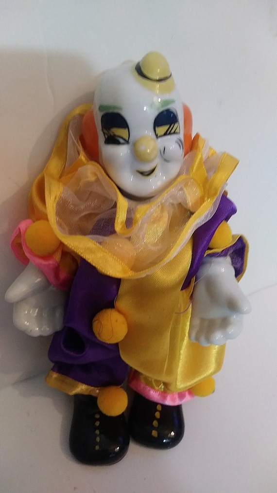 old porcelain clown dolls