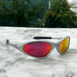 Oakley MINUTE 1.0 サングラス シルバー グレー Oakley Minute 1.0 X-metal Silver Sunglasses W/ Fire Iridium