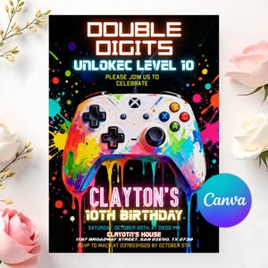 May include: A black invitation card with the text "DOUBLE DIGITS UNLOKEC LEVEL 10" and "CLAYTON'S 10TH BIRTHDAY". A colourful, paint-splattered video game controller is the central image. The Canva logo is in the bottom right.