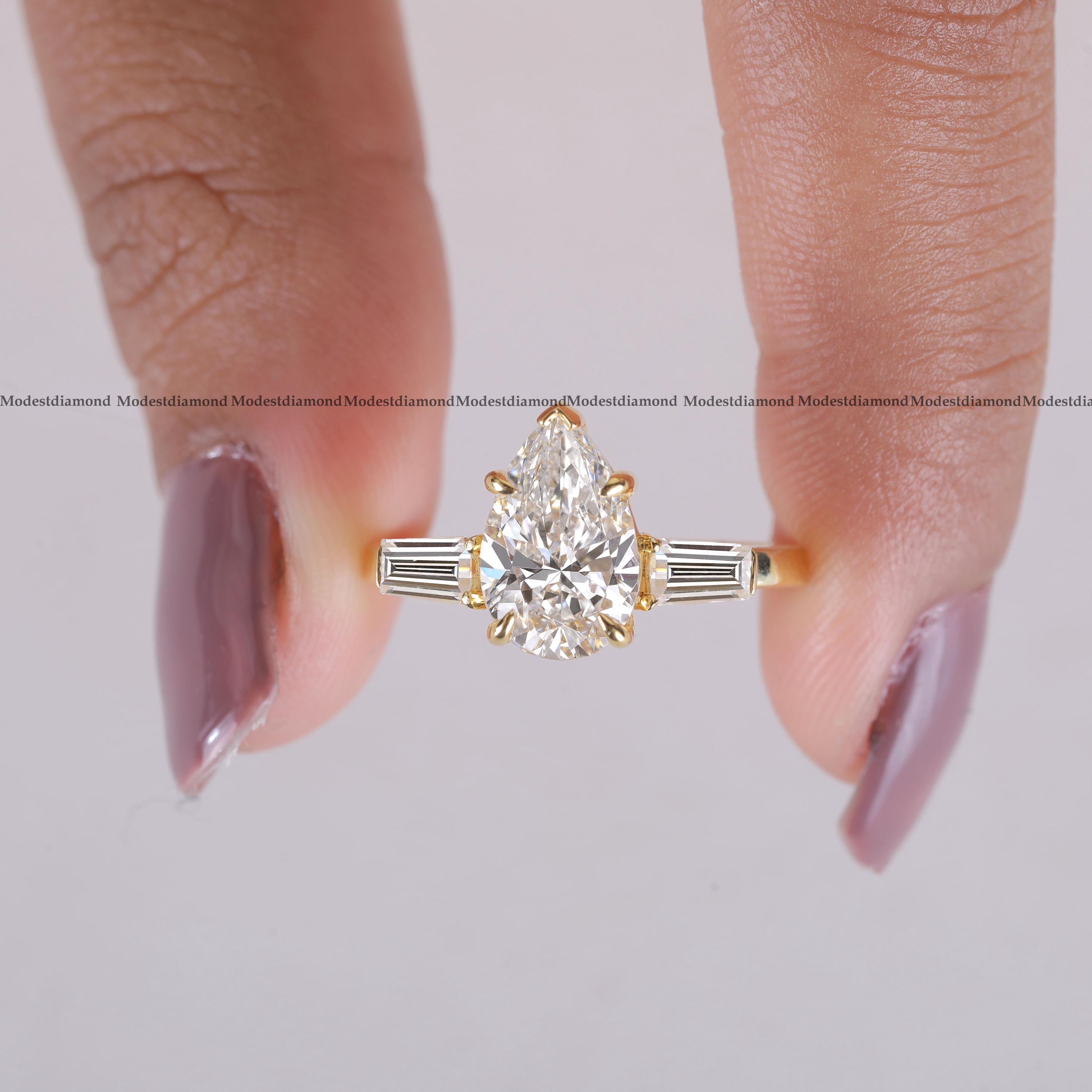 Pear Cut Moissanite Three Stone Engagement Ring in Gold With Baguette ...