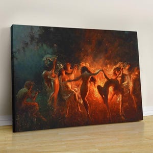 Op de afbeelding: Een canvas print van een klassiek schilderij met naakte figuren die rond een vuur dansen. Het kunstwerk gebruikt warme oranje- en roodtinten van het vuur, die contrasteren met de koelere blauw- en groentinten op de achtergrond.
