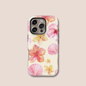 May include: A phone case with a cream background featuring a watercolour pattern of pink hibiscus flowers, yellow flowers, and pink seashells. The case has a glossy finish and a camera cutout.