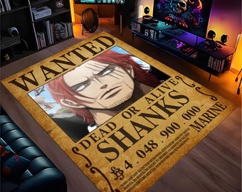 May include: A rectangular rug with a wanted poster design featuring a red-haired anime character. The poster reads "WANTED" at the top, with "DEAD OR ALIVE" and "SHANKS" below. The rug has a beige background with black text and a detailed illustration.
