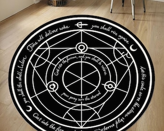 May include: Black round rug with a white alchemical circle design. The design includes geometric shapes, symbols, and text in a circular pattern. The rug is on a wooden floor.