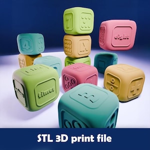 May include: A collection of colorful, soft-sided cubes with numbers, math symbols, and the word "time" embossed on their surfaces. The cubes are in shades of green, pink, yellow, and blue. The text "STL 3D print file" is at the bottom.