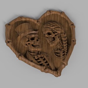 May include: A wooden heart-shaped plaque with a carved design of two skeletons. One skeleton wears a top hat and bow tie, the other has braided hair. The artwork is made of light brown wood.
