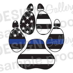 May include: Black and white paw print with a blue line running through the center. The paw print is divided into sections with alternating black and white stripes and a section with stars.
